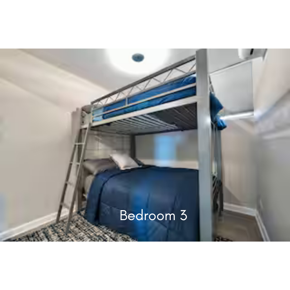 Bunk beds in a bedroom labeled Bedroom 3, with a ladder leaning against the lower bed for access to the top bunk.