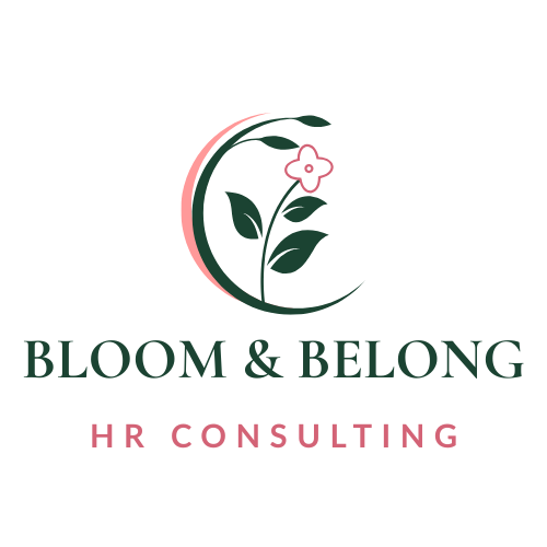 Logo for Bloom & Belong HR Consulting featuring a stylized flower with green leaves and pink accents.