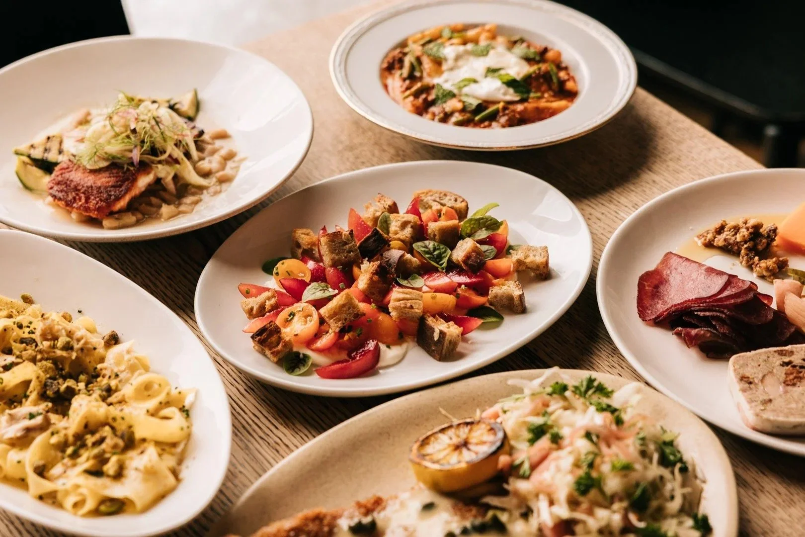 Shared plates of Alpine European food at Table, Donkey and Stick