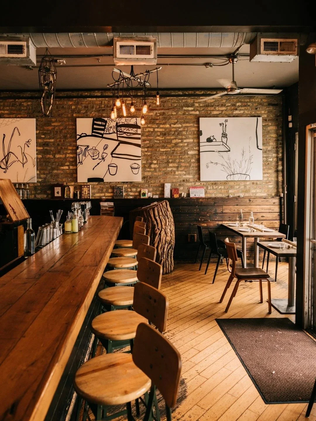 Bar seating and brick walls at Table, Donkey and Stick