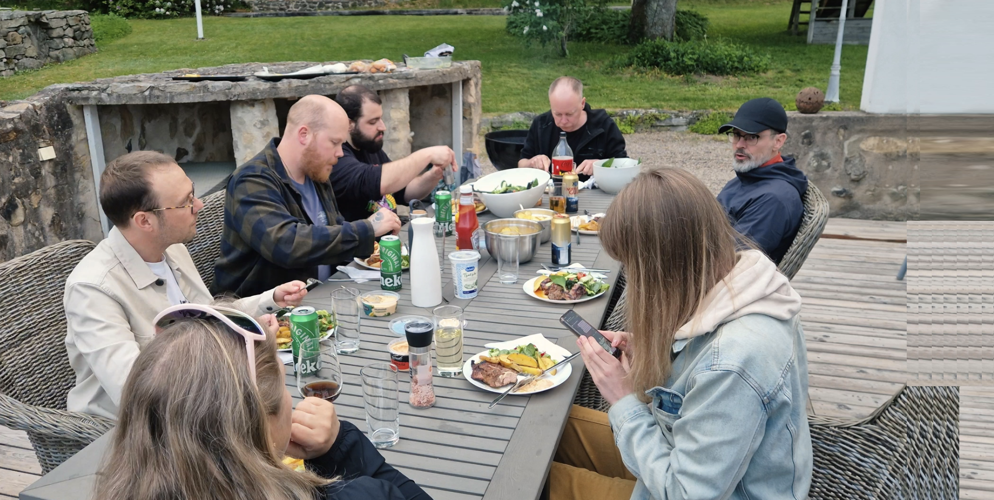 The SweBITS team eating outdoors.