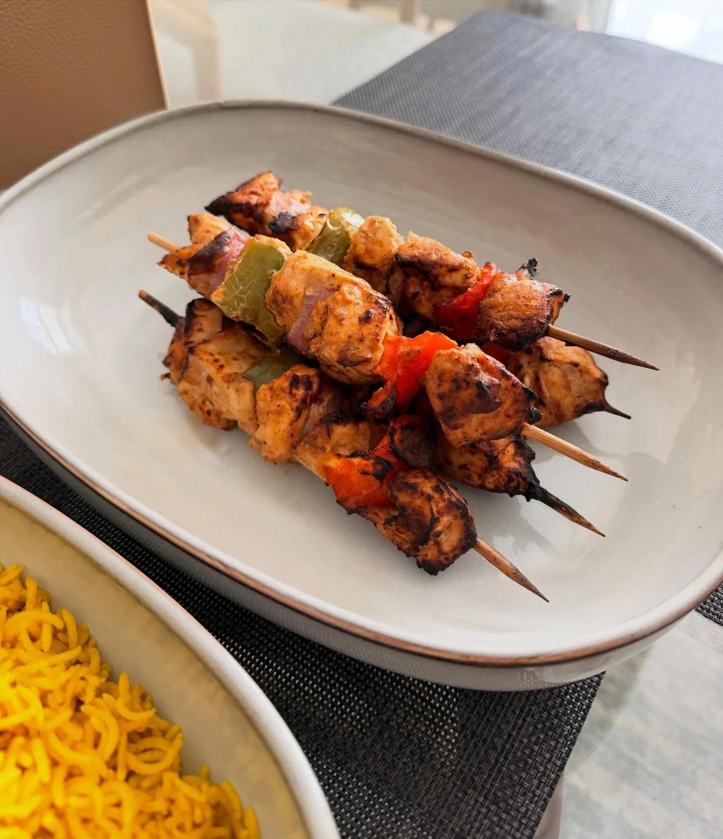 This might be my new favorite high-protein lunch.

Air fryer shish tawook, yellow rice, and a simple tomato and cucumber salad.

Full of flavor, incredibly easy to make, and the air fryer gave the chicken those charred edges while keeping it perfectl