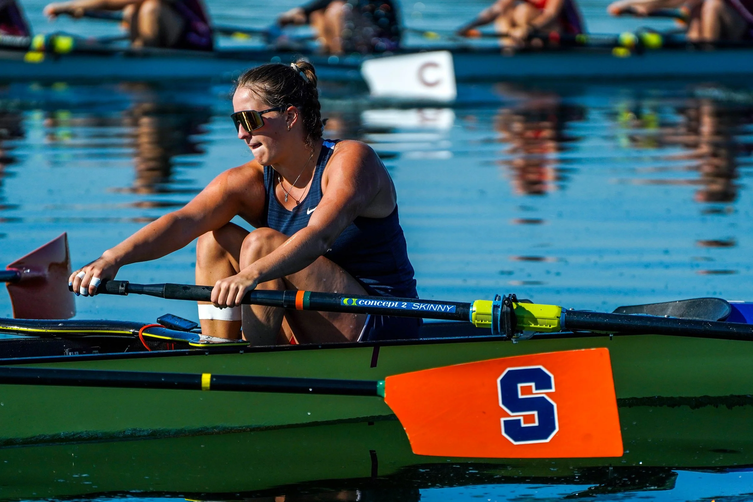 Syracuses womens rowing team competiting against Cornell University in Onondaga Lake, NY. Photo by Emily Hoban.