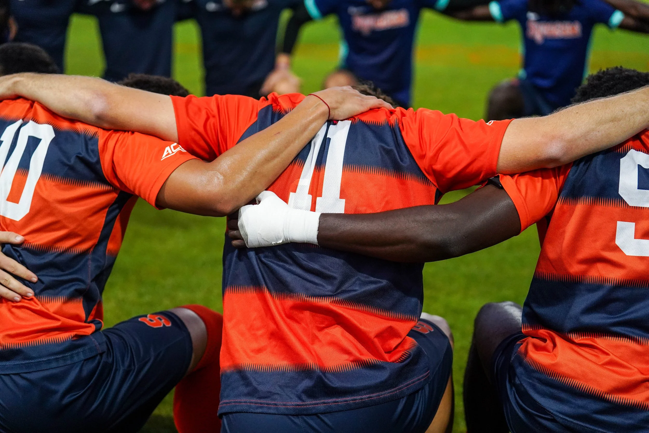 Syracuses Bryson Rodriguez #11 in huddle with mens soccer game. Photo by Emily Hoban.