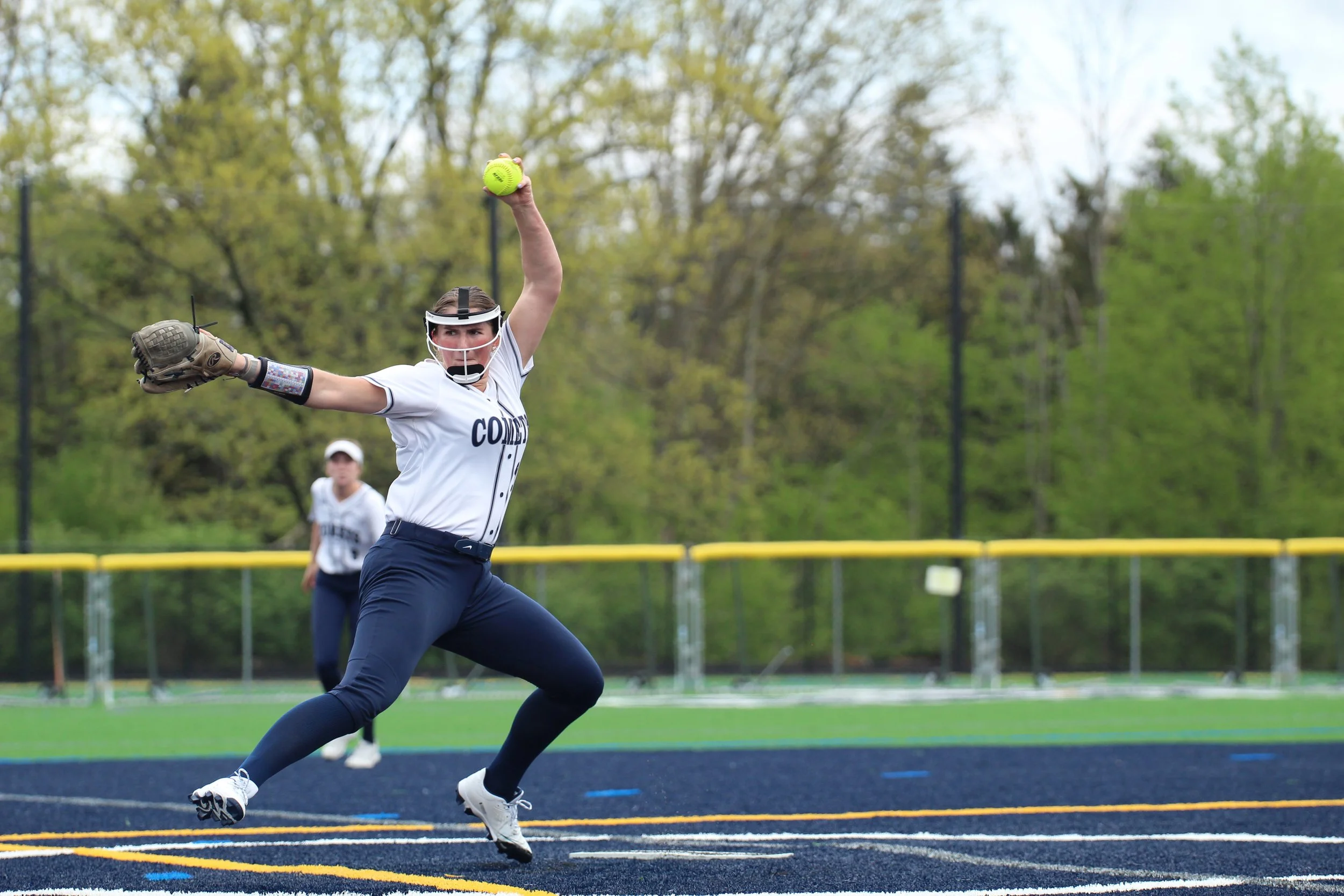 Abington Heights Lauren Stalica #27 throwing first pitch during softball game. Photo by Emily Hoban.