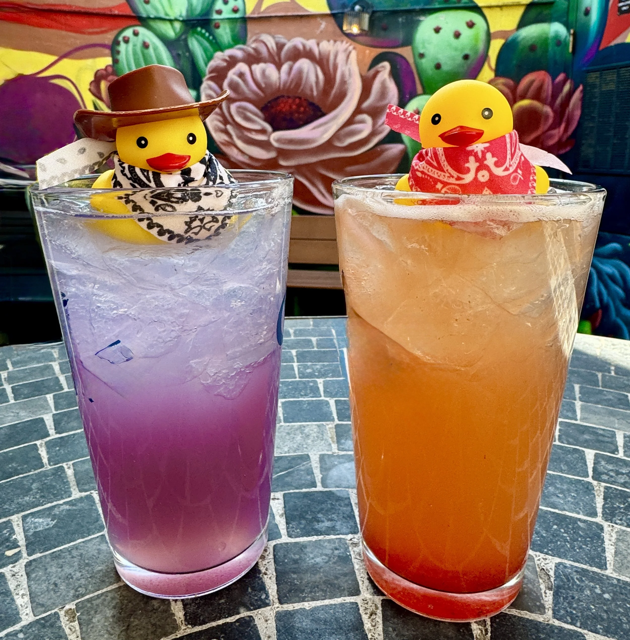 A pair of colorful cocktails