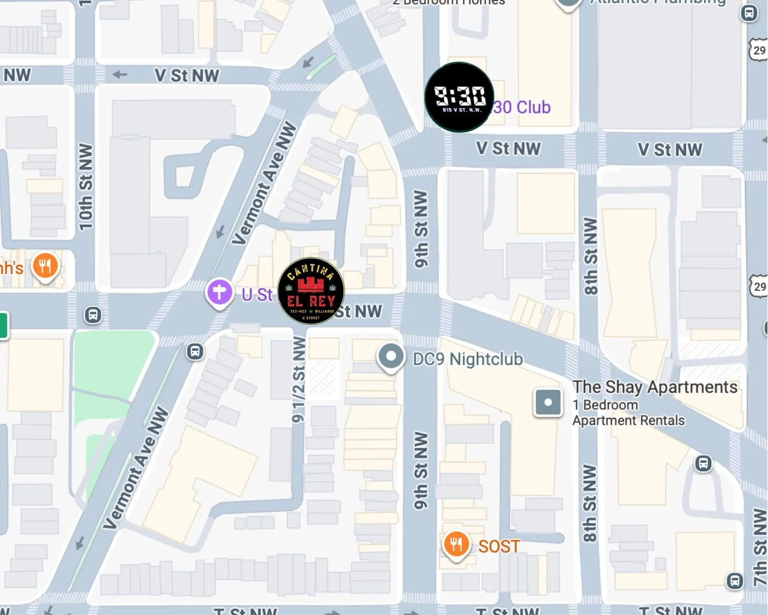 Map showing downtown area with streets and landmarks, including Clock showing 9:30, restaurant Sost, nightclub DC9, and apartment complex The Shay Apartments.