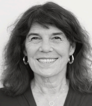 Sharon Meieran smiling at camera; black and white photo for the Voters' Pamplet