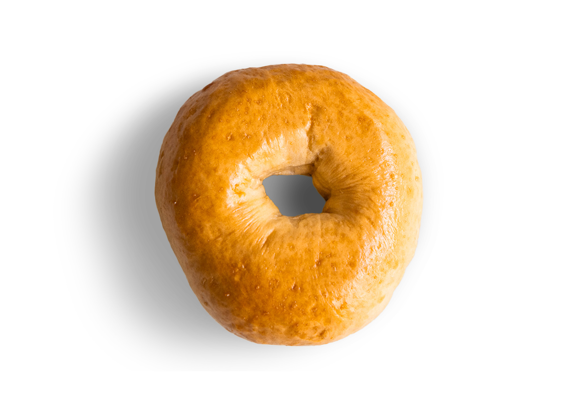 A close-up of a bagel with a hole in the center, set against a transparent background.