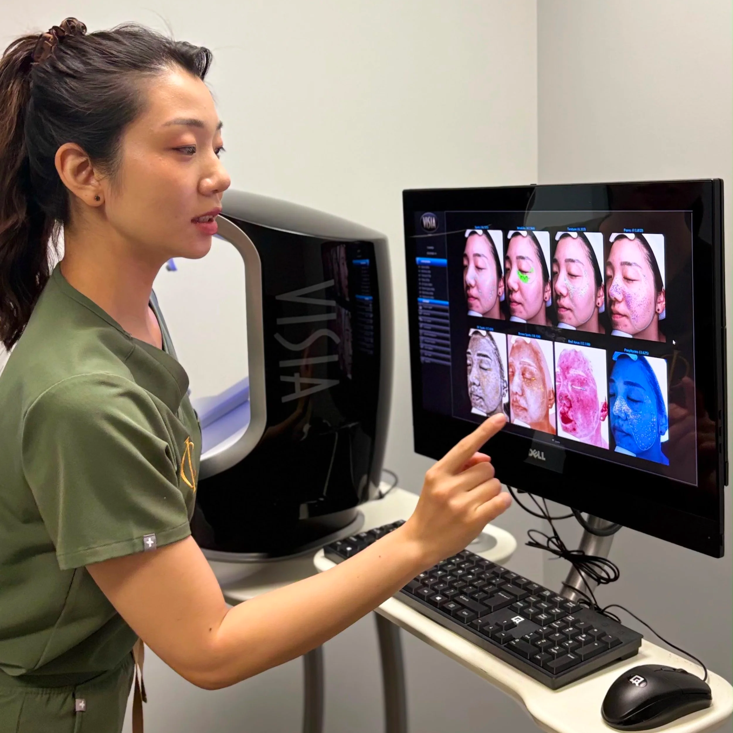 Scarlett, Lead Medical Aesthetician at Phi Skin Clinic, reviewing