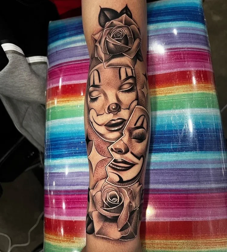 Tattoo of three women smiling and posing, surrounded by roses, on a person's forearm.