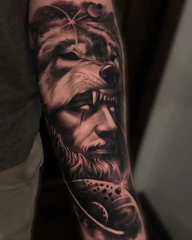 Tattoo sleeve featuring a wolf's face blending into a man's profile with a beard, surrounded by cosmic elements like planets, stars, and a comet.
