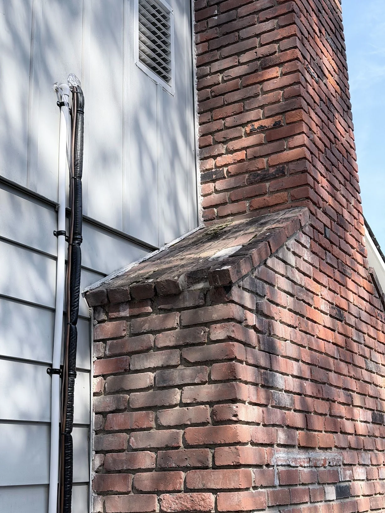 exterior_chimney_deteriorated_brick_and_mortar.jpg