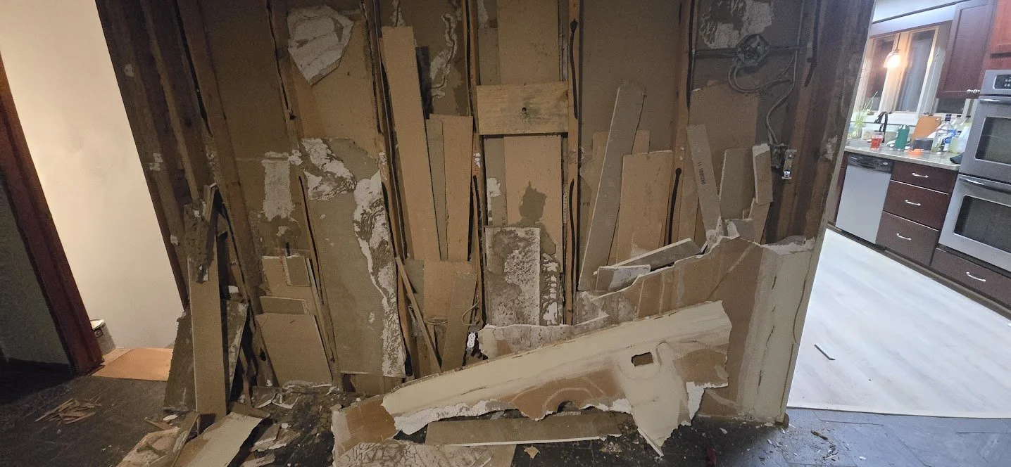 interior_wall_drywall_removed_with_debris.jpg