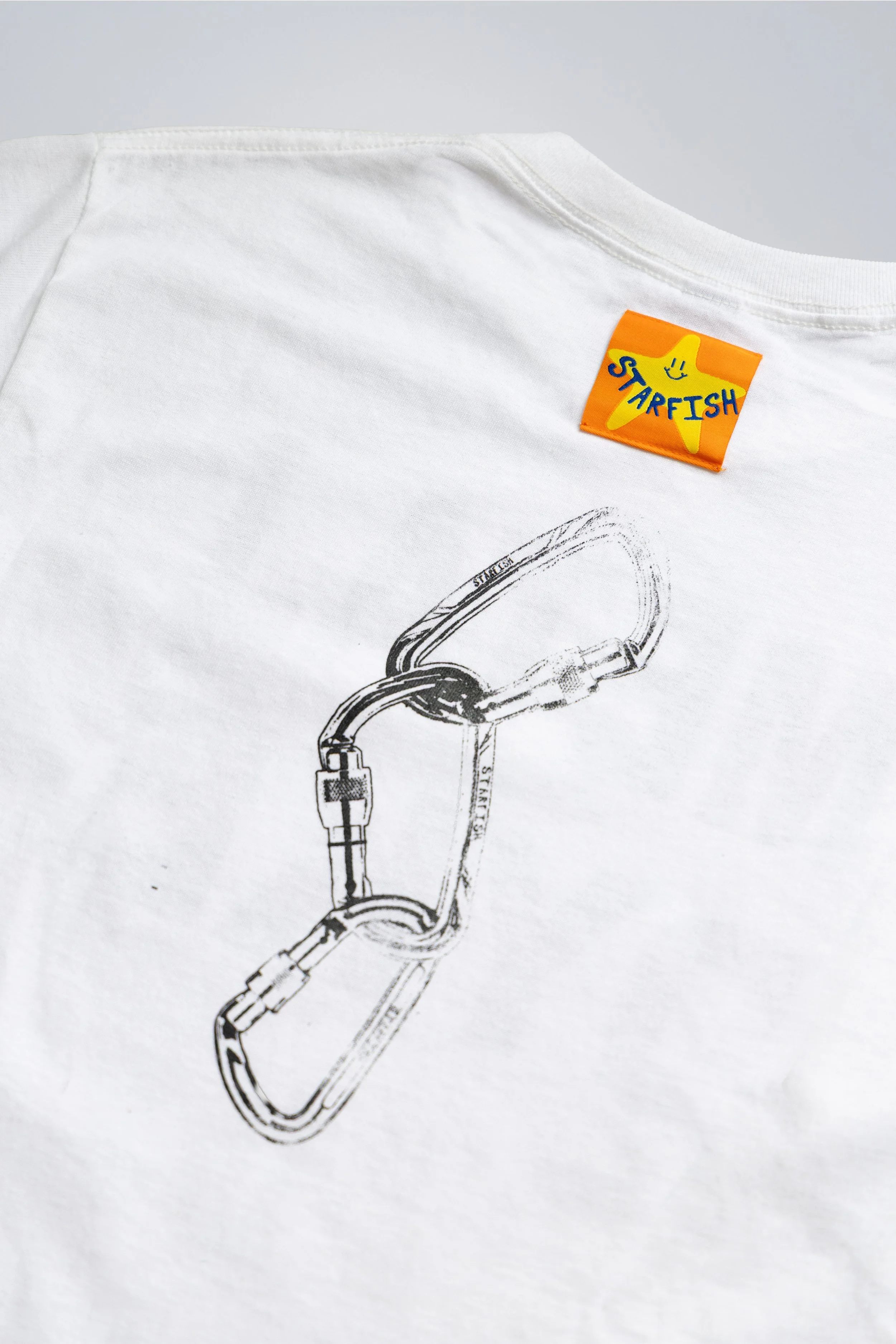 Metal Dyke white back detail_1.jpg