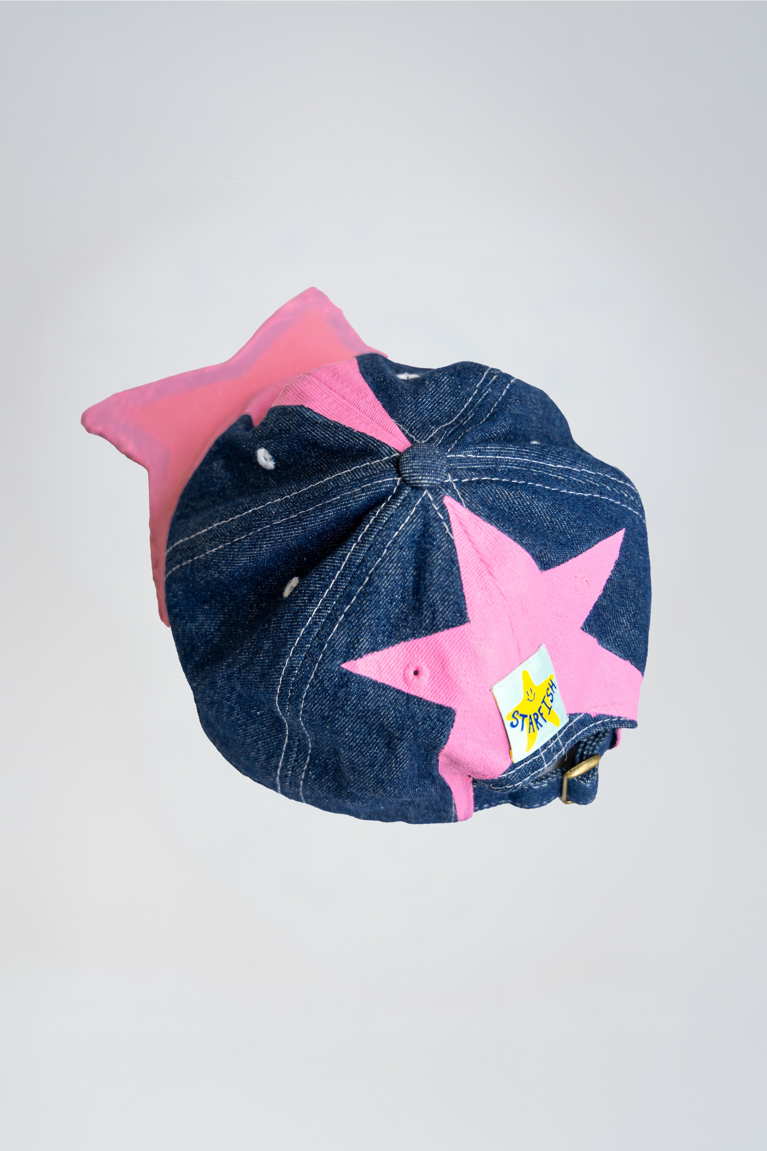 STAR CAP PINK ARMS BACK.jpg
