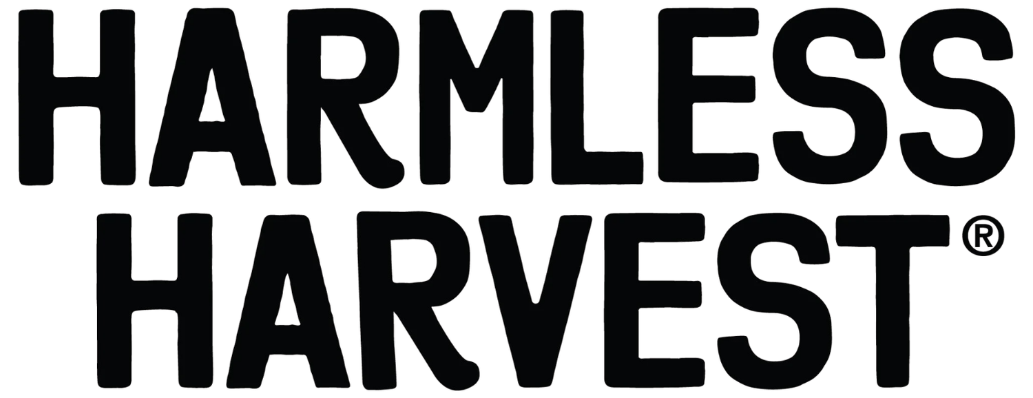 The image features the phrase 'HARMLESS HARVEST' written twice in bold black letters on a white background.