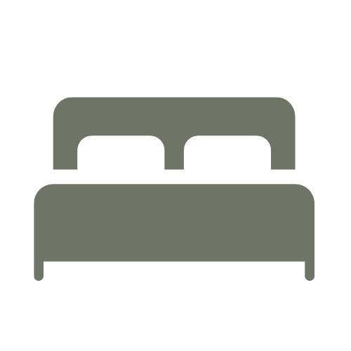 Simple icon of a bed with two pillows.