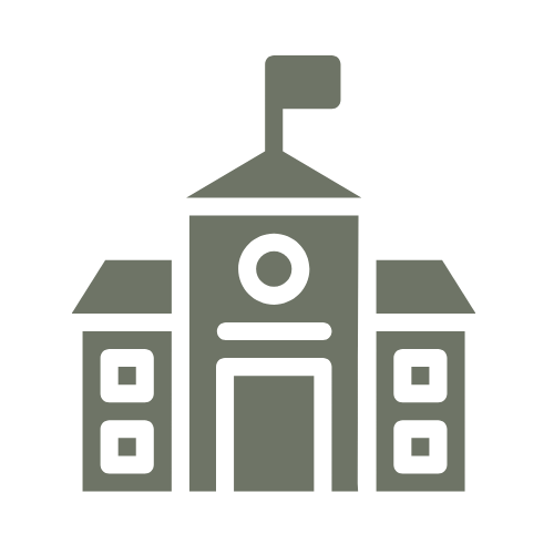 Simple line drawing of a school building with a flag on top.