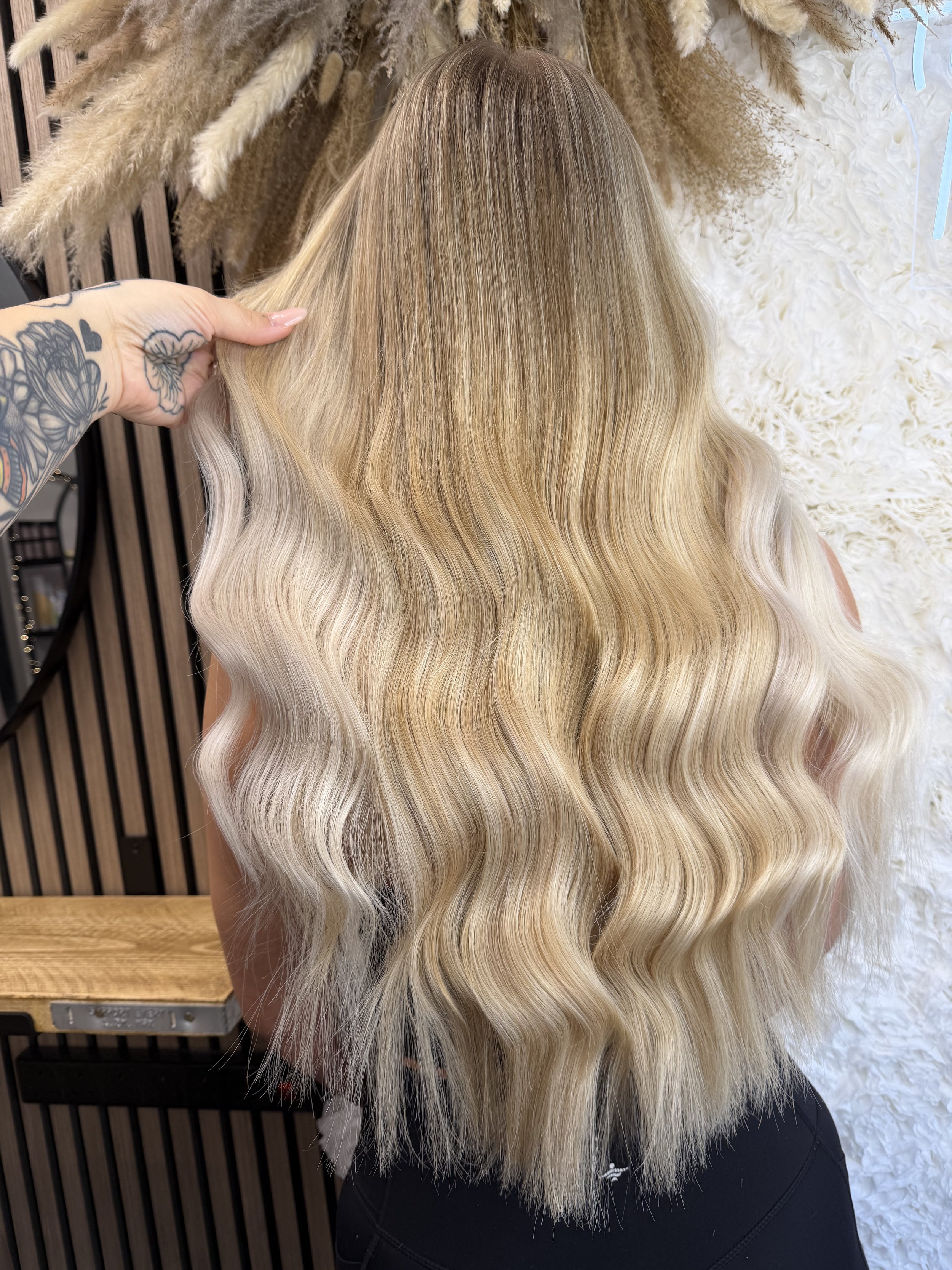 Loxy Locks Hair Academy signature curls tape and weave fitting