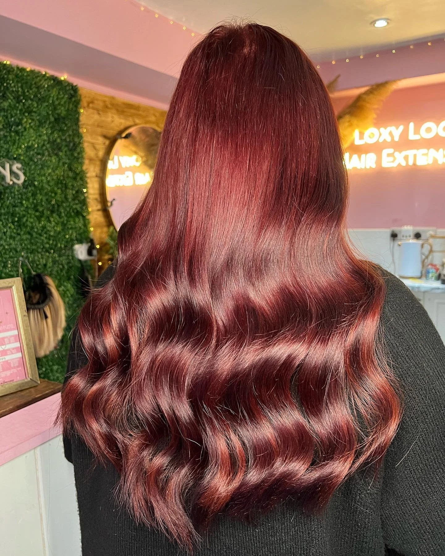 Red long, smooth, Burgundy hair with large, soft curls 3 row weave Loxy Locks Hair Academy