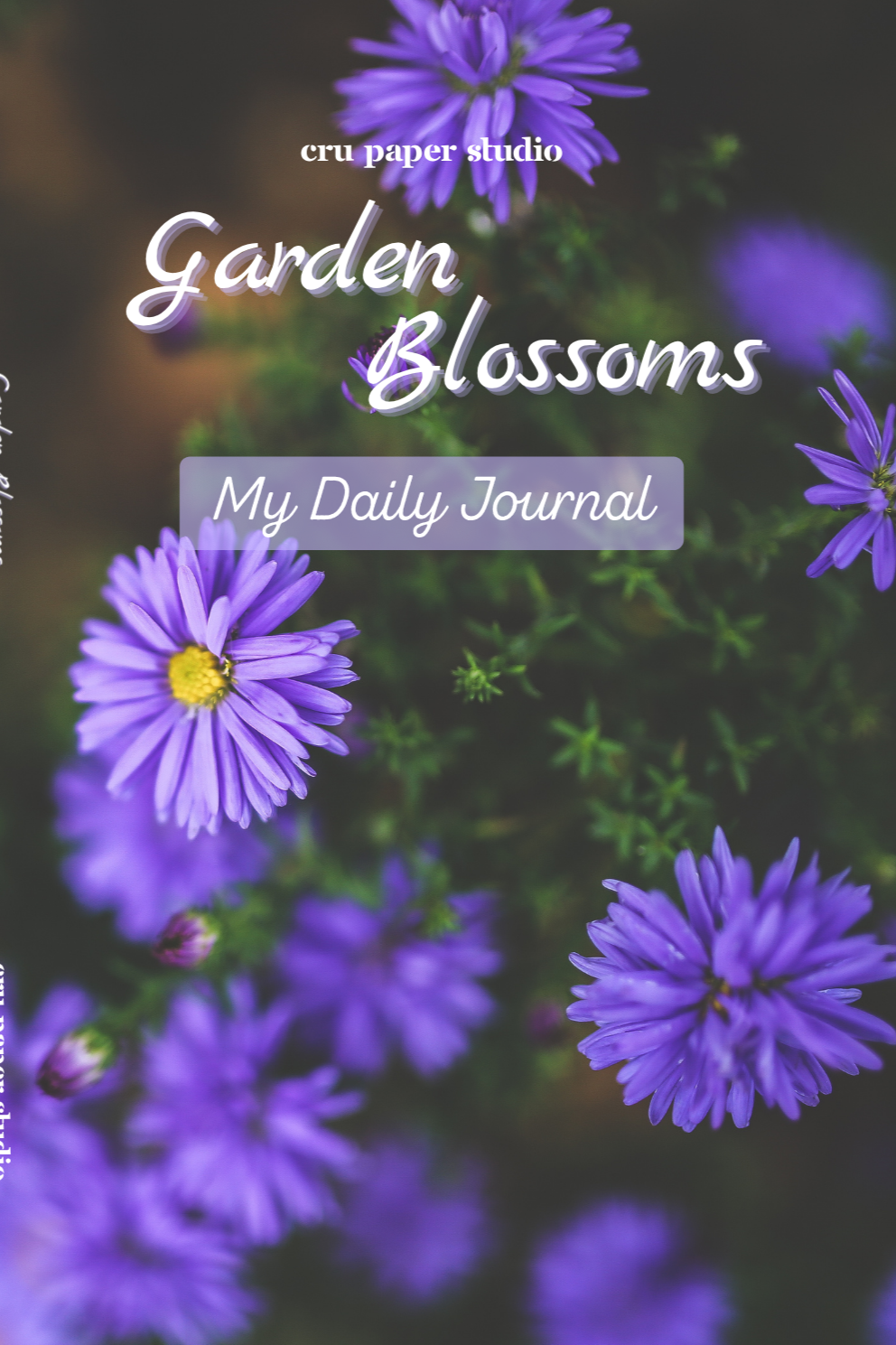 Cover of a daily journal titled "Garden Blossoms" with purple and yellow flowers in the background.
