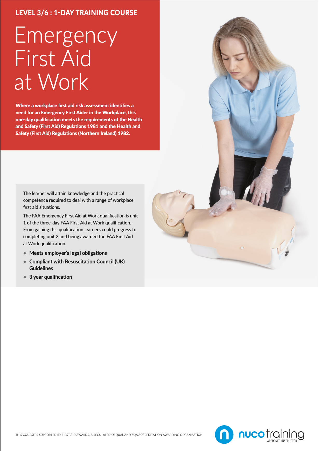 A woman in a light blue shirt performs CPR on a training mannequin using hand placement for chest compressions, part of an emergency first aid training session.