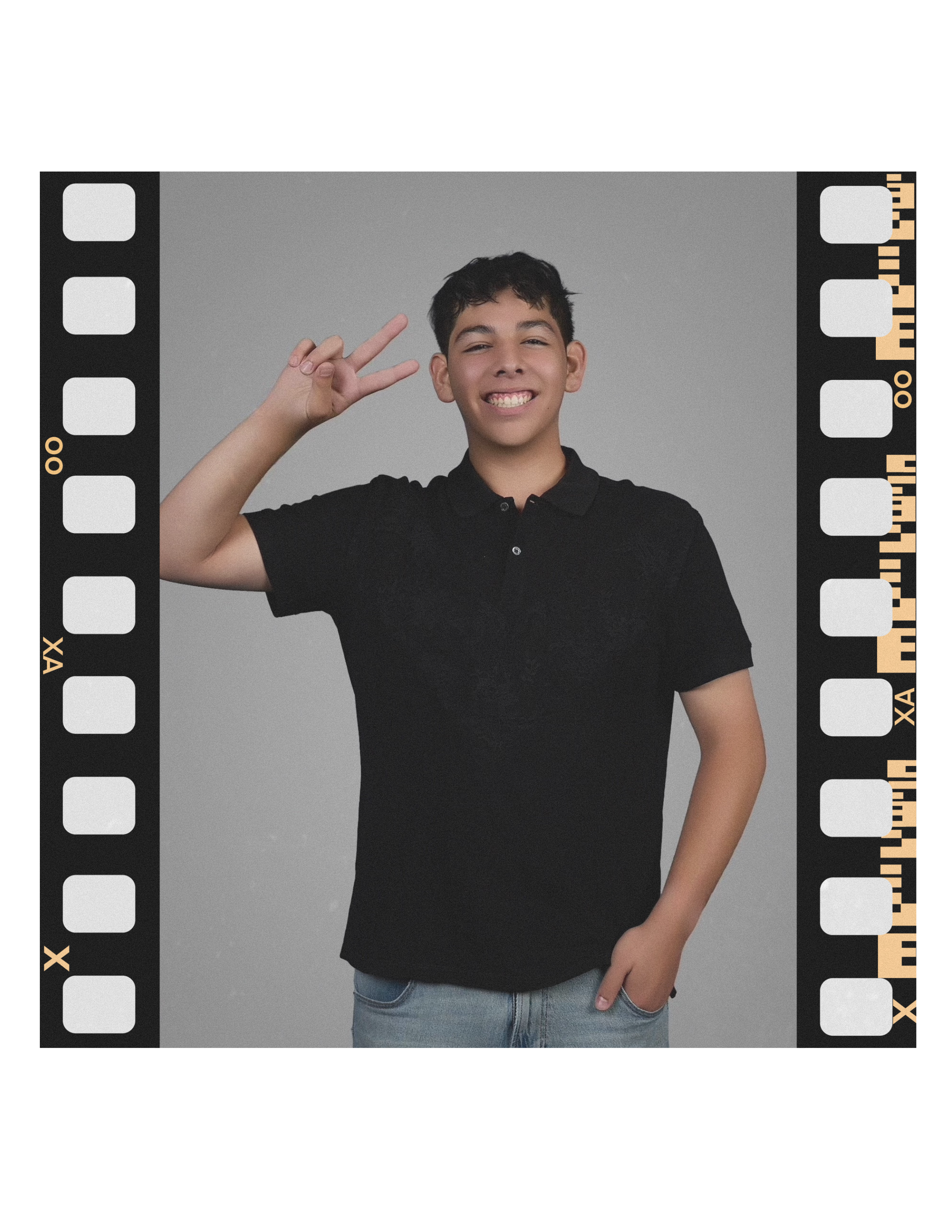 Young person with dark hair wearing a black polo shirt making a peace sign with their right hand, smiling against a plain background.