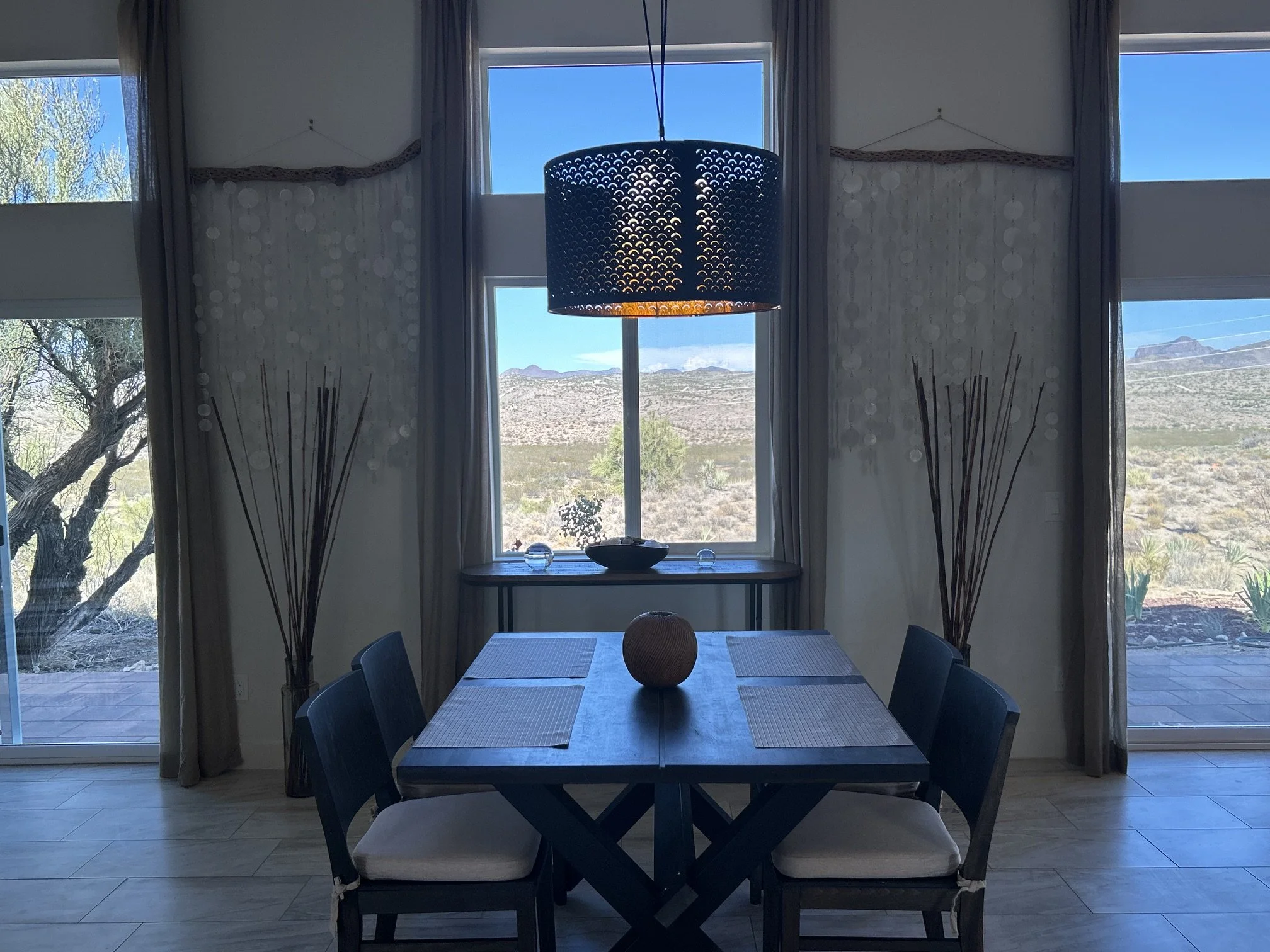Peaceful dining space with expansive Arizona desert and mountain views.
