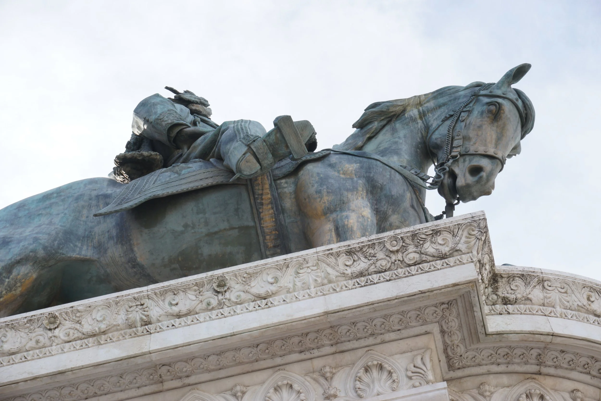 Close-up of the Lincoln Memorial statue of Abraham Lincoln on a horse, showing its detailed craftsmanship and historical significance.