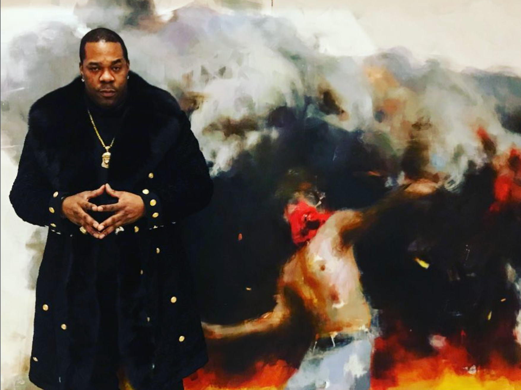 Busta Rhymes, multiple Grammy Award nominated American rapper, record producer, and actor; standing in front of one of Jerome Lagarrigue's riot scene from the Tipping Point.