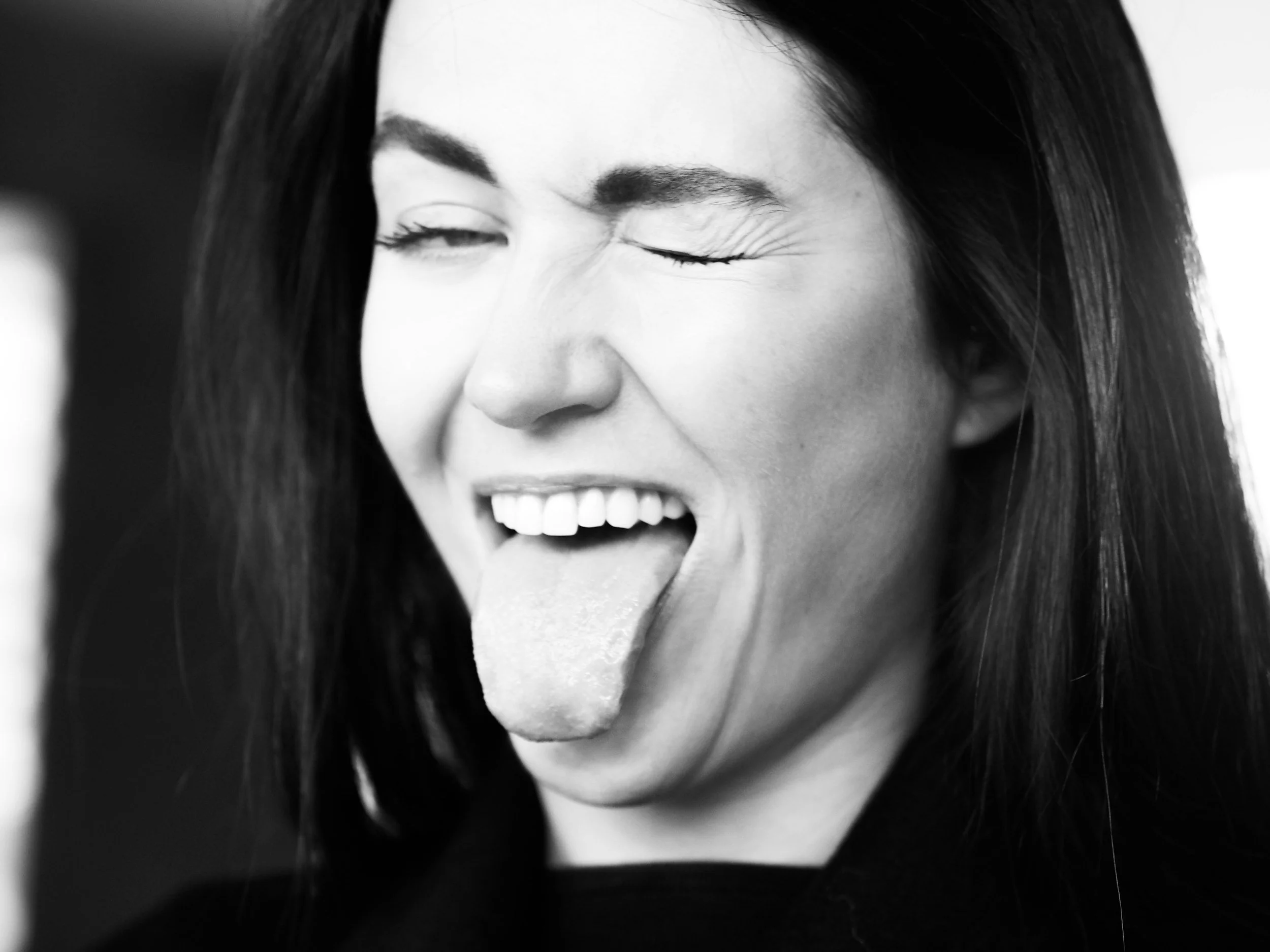 Woman Sticking Her Tongue Out - Oral Habit Elimination Program