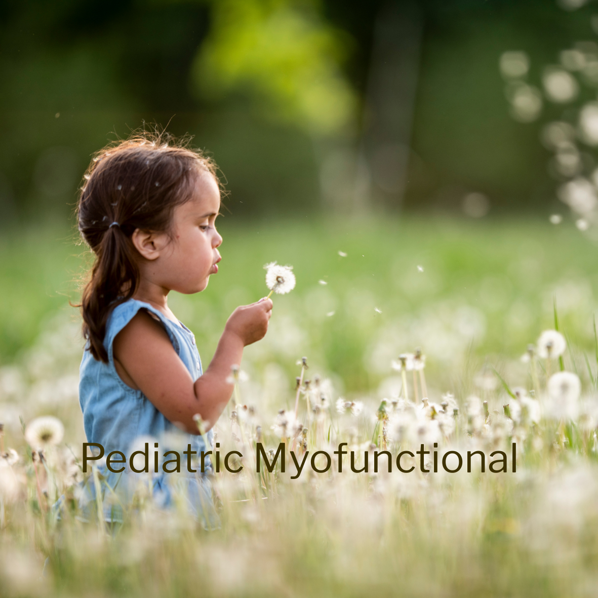 A young girl blowing on a dandelion in a grassy field with a blurred green background. The words "Pediatric Myofunctional" are overlaid at the bottom of the image.