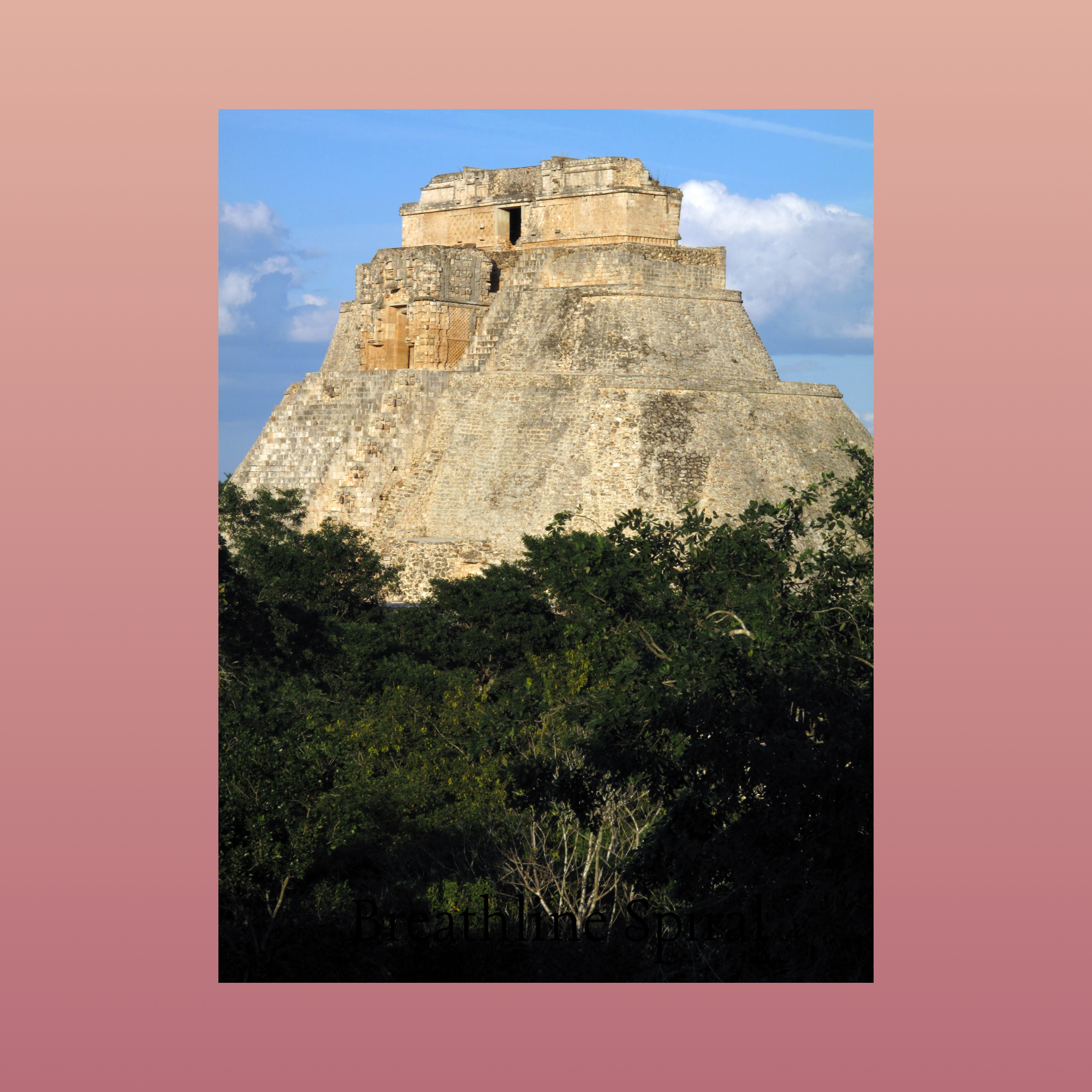 Ancient stone Mayan pyramid with a temple on top, surrounded by lush green trees, under a blue sky with fluffy white clouds.