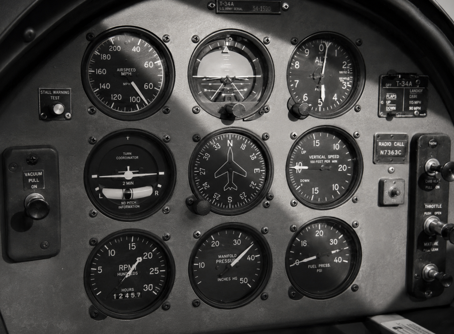Analog military training aircraft cockpit instruments.