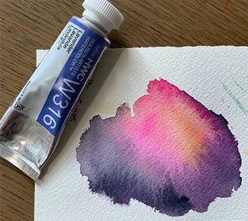 purple pink orange watercolor paint splotch, tube of lavender watercolor paint