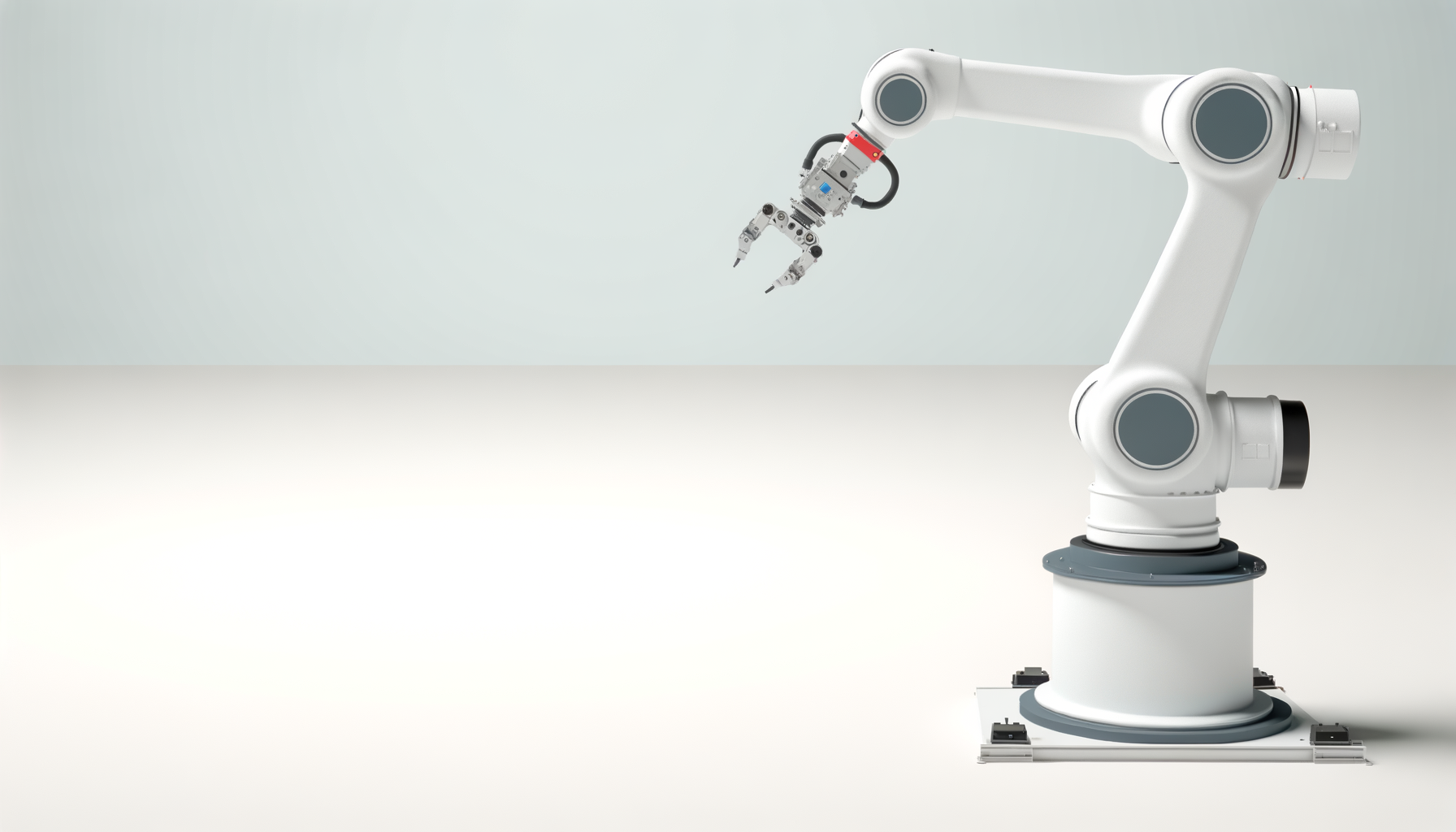 A white industrial robot arm with a robotic end effector hanging in an empty light gray space.