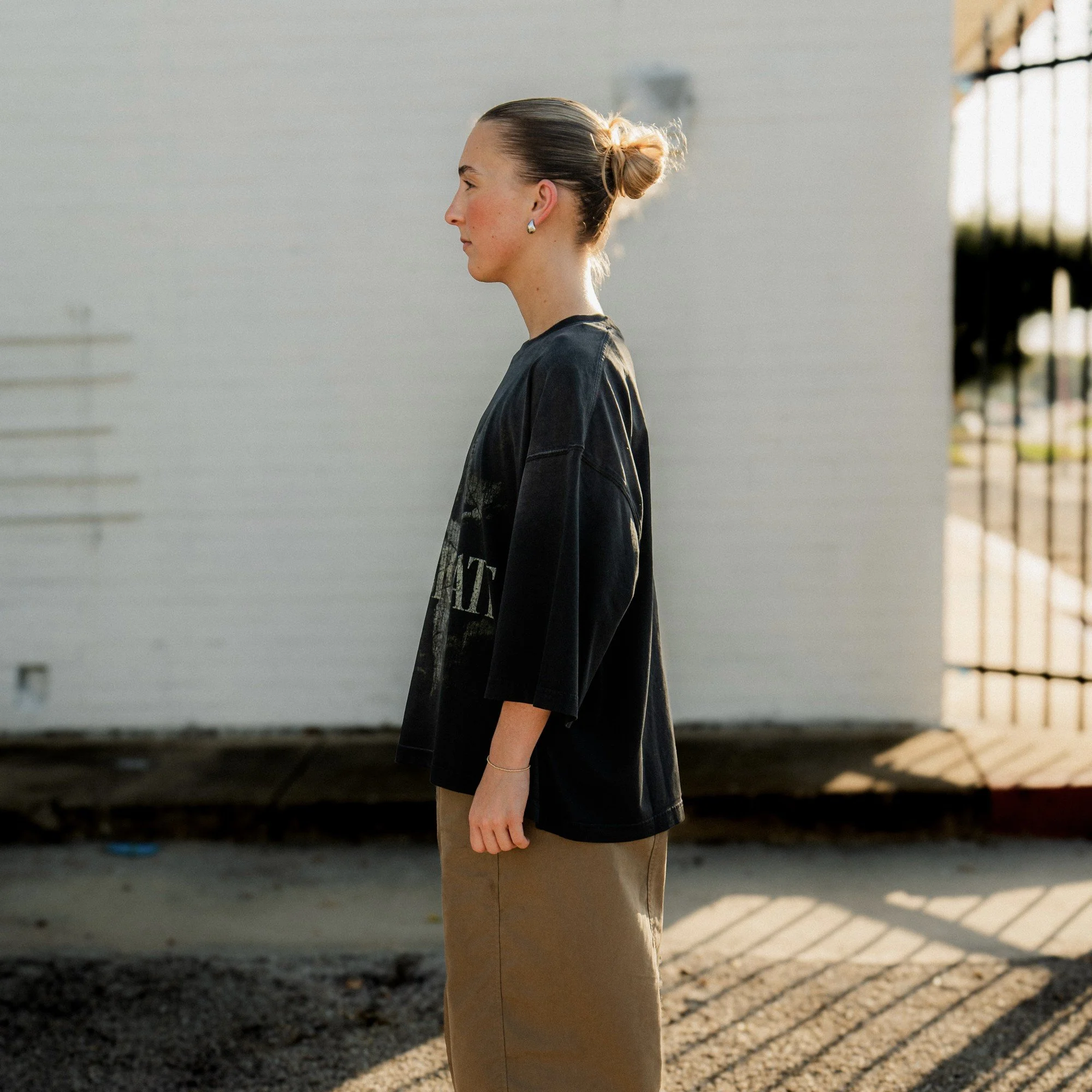 Passionate Tee side view, worn by model