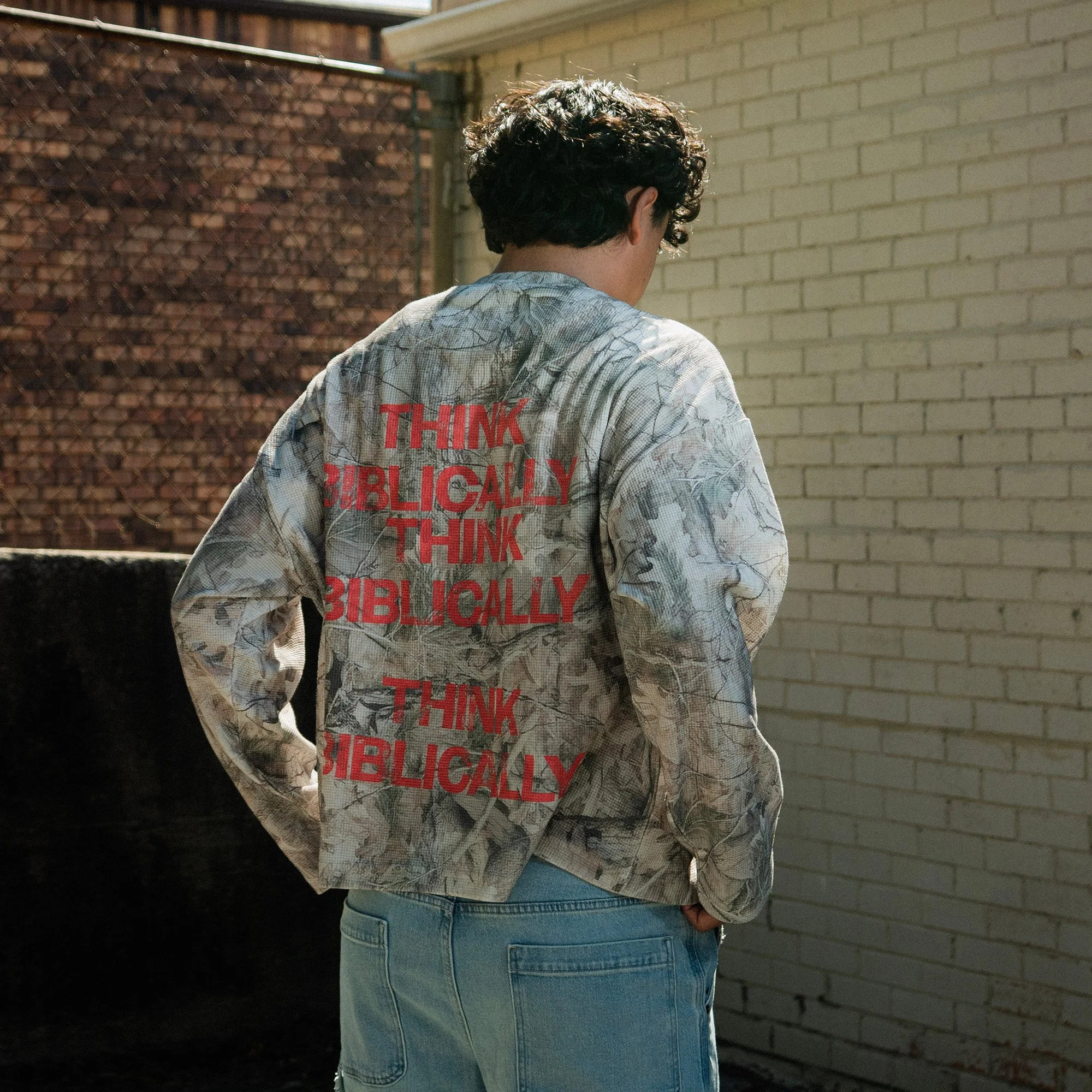 Think Biblically Camo Long Sleeve back, worn by model