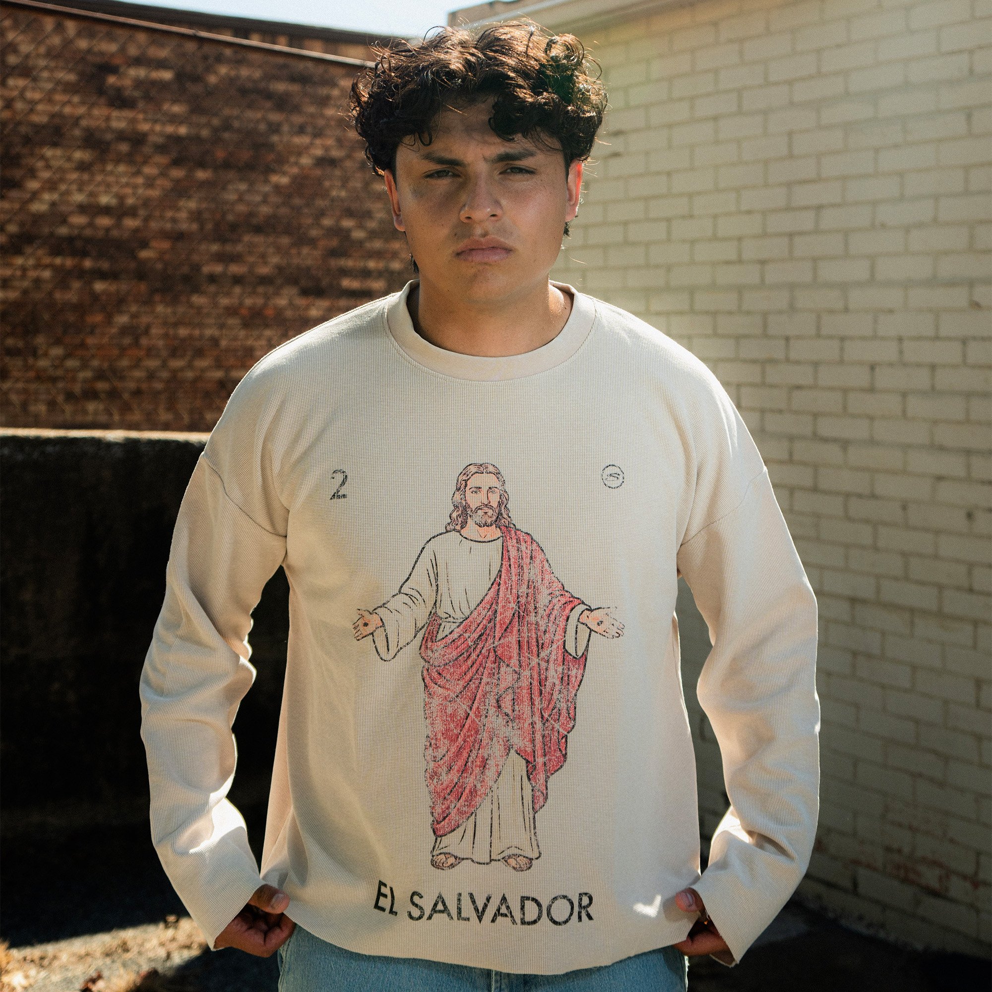 El Salvador Long Sleeve front graphic close-up, worn by model