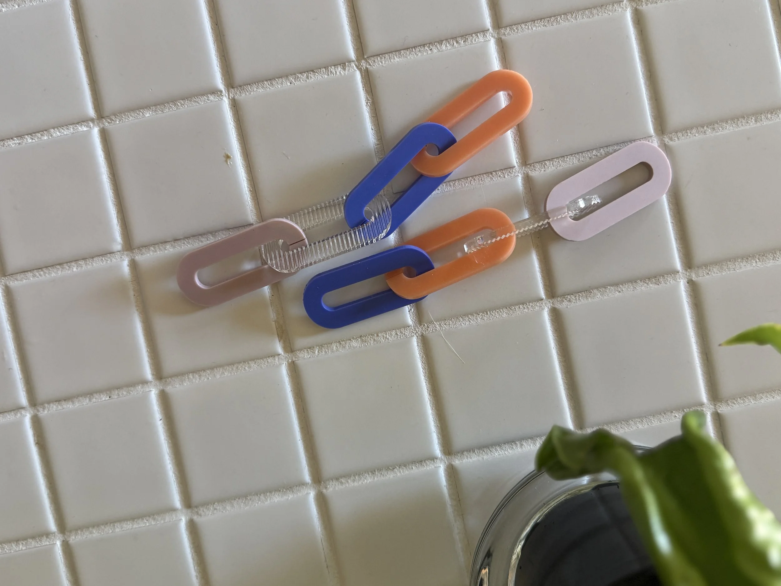 The Spano Earring in peach, Iris, Pale Pink, & Ribbed Clear XTRA LONG