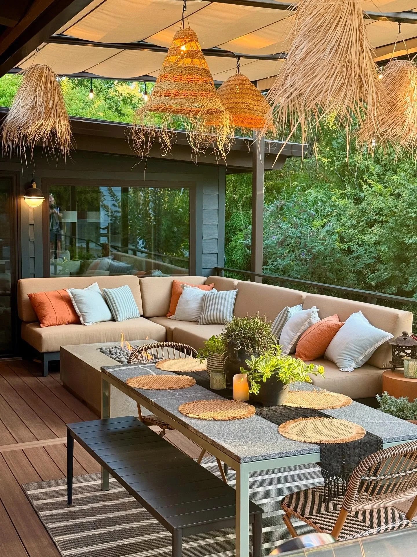 My new outdoor living space features all of my favorite things: warm colors, Moroccan vibes, lots of greenery, and a playful mix of textures. Furniture from Terra Outdoor, Restoration Hardware, and Room and Board create comfy spots to read a book, si