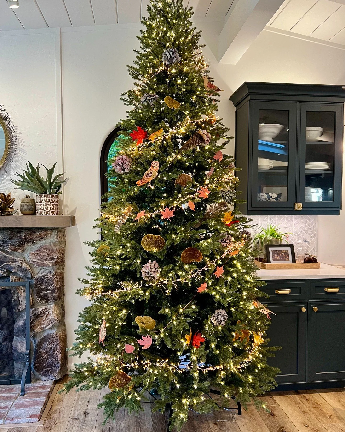 I really, really wanted to put my tree up early this year (for all the cozy vibes), but I still had to host Thanksgiving and didn't want my house to look Christmasy just yet--so I came up with this temporary compromise: the Thanksgiving Tree! Tomorro