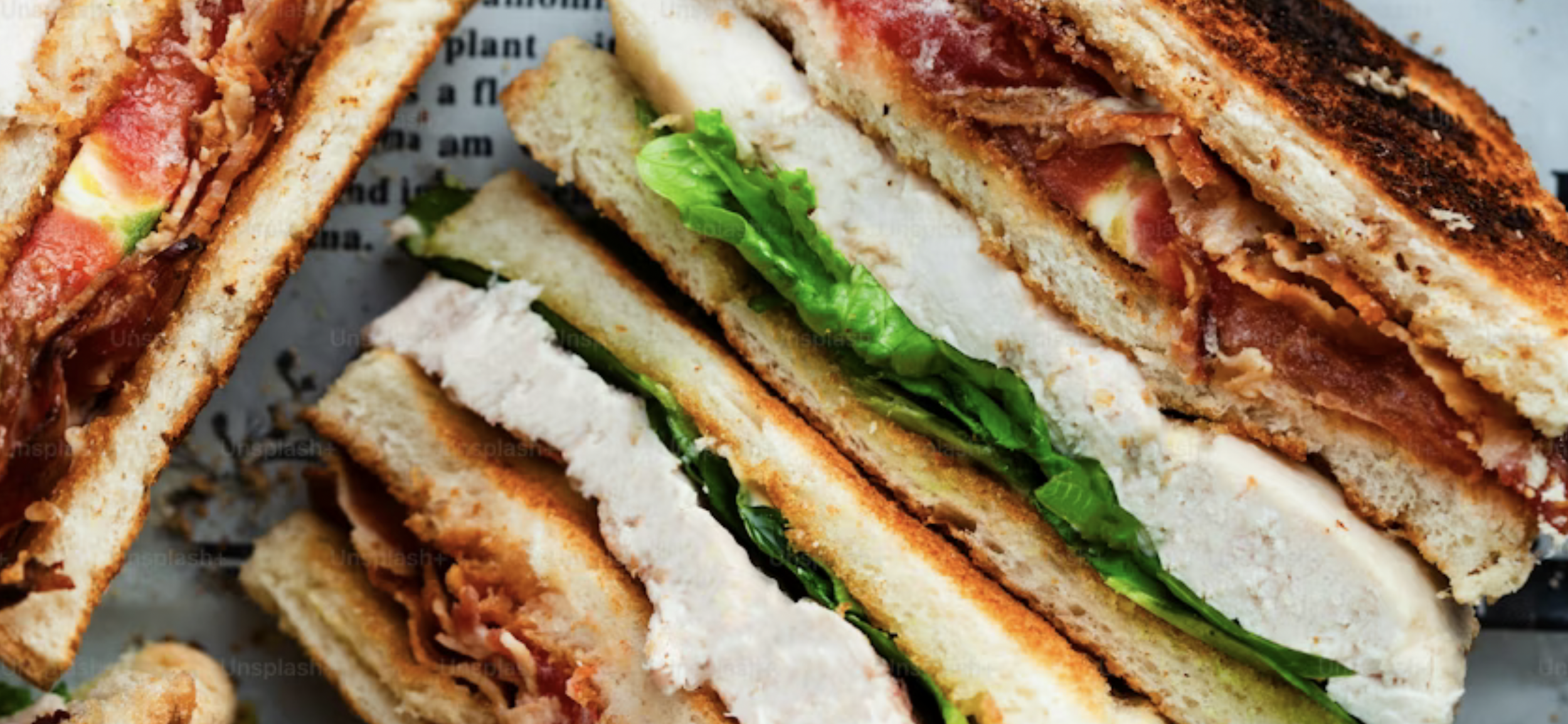 Menu of pressed sandwiches (panini), soups, sides, and desserts at the Daily Press
