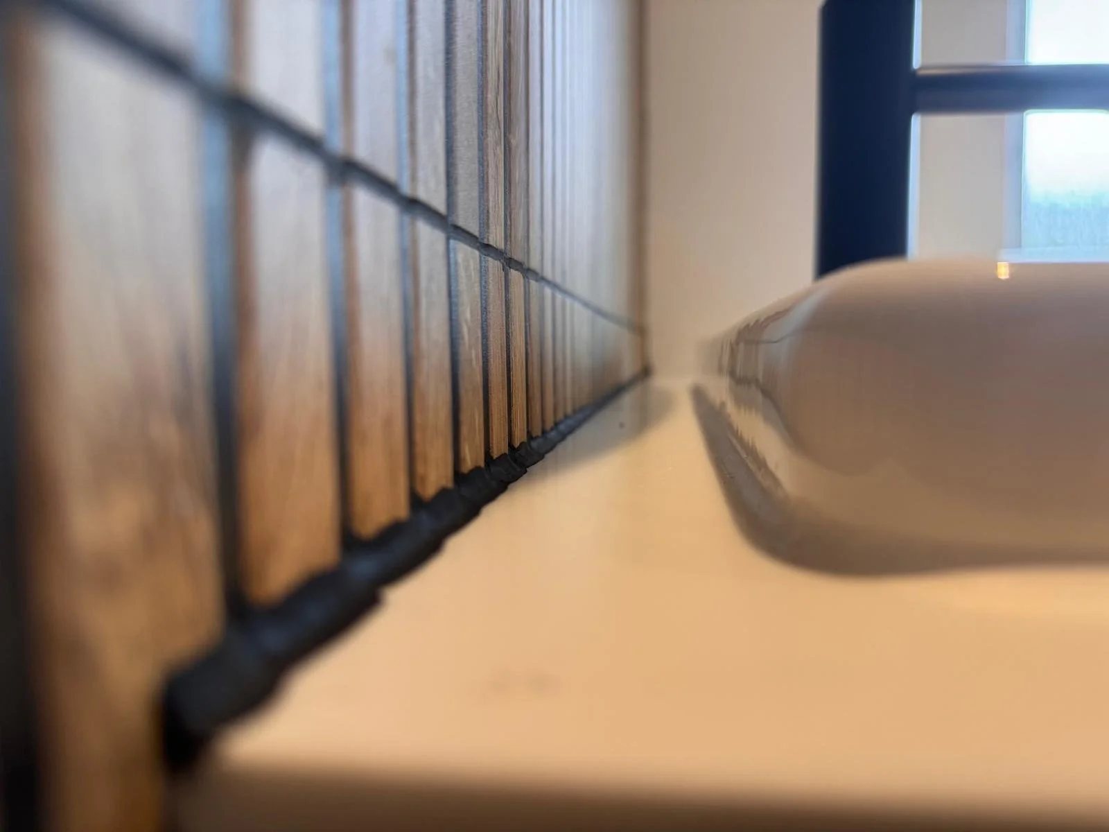 Detail of tile and silicone finish - M.R. Pro Bathrooms craftsmanship