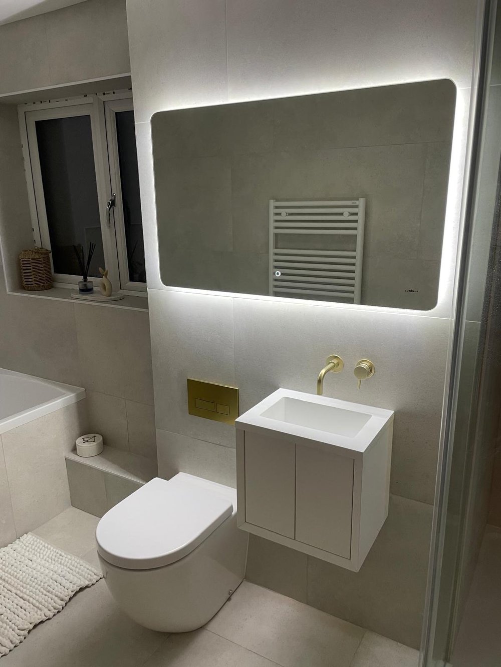 Modern bathroom with LED mirror and concrete tiles - M.R. Pro Bathrooms Nottingham