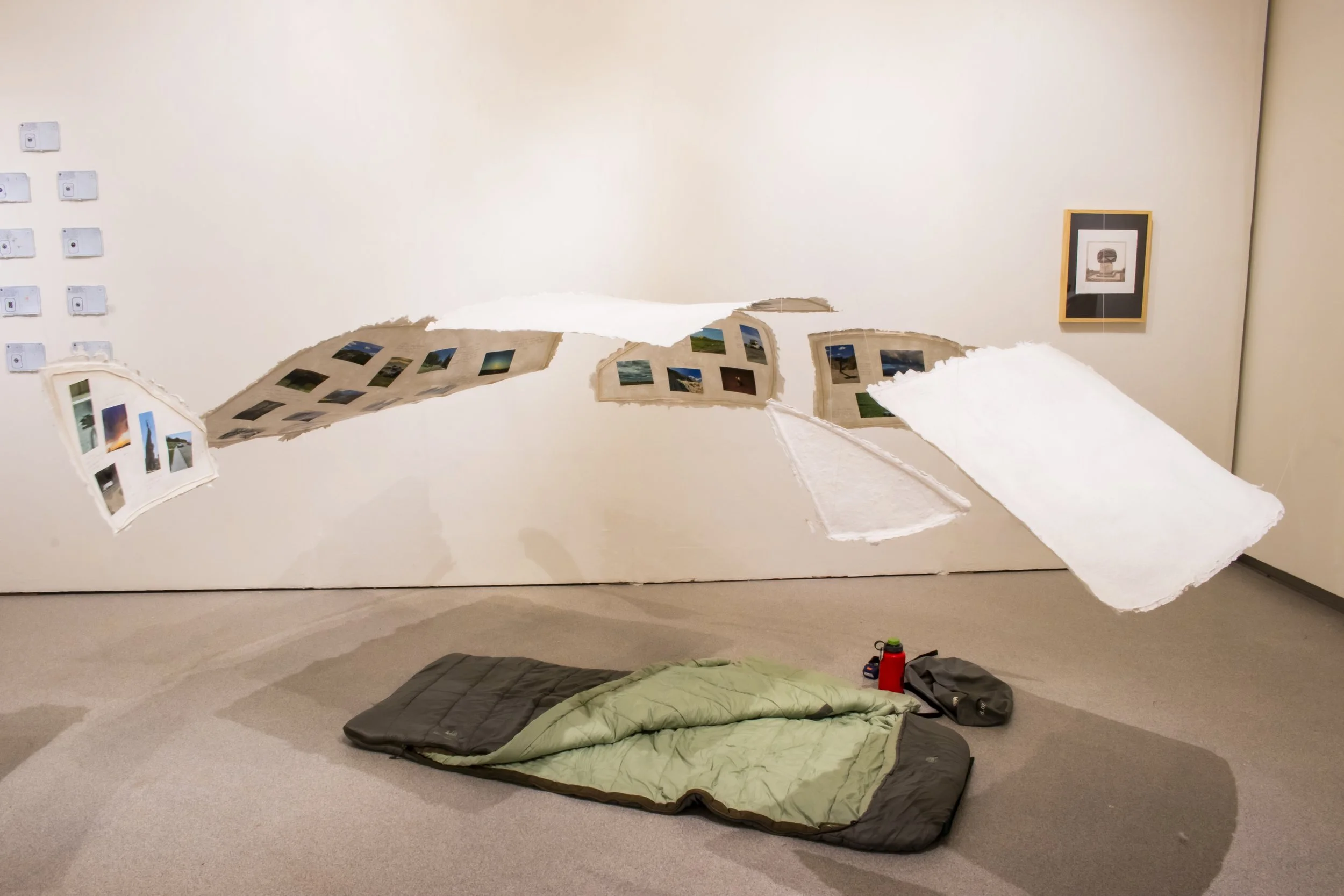 6732 Miles, installation of cast paper, photos, and objects, 2026