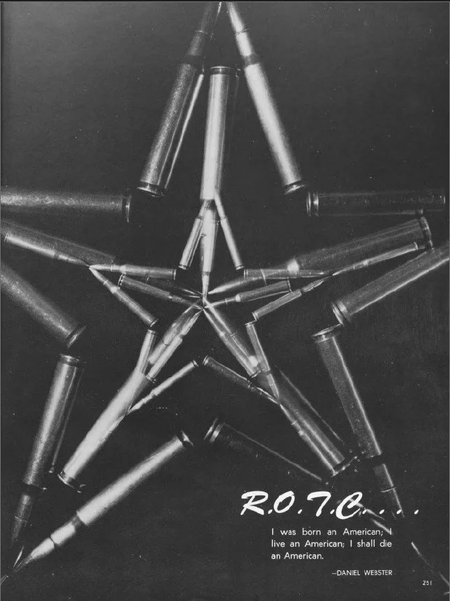 Black and white photo of a star shape made out of fluorescent light tubes. Text reads, "R.O.T.C. I was born an American; live an American; I shall die an American. - Daniel Webster."
