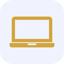Laptop computer with a gold body on a light background.