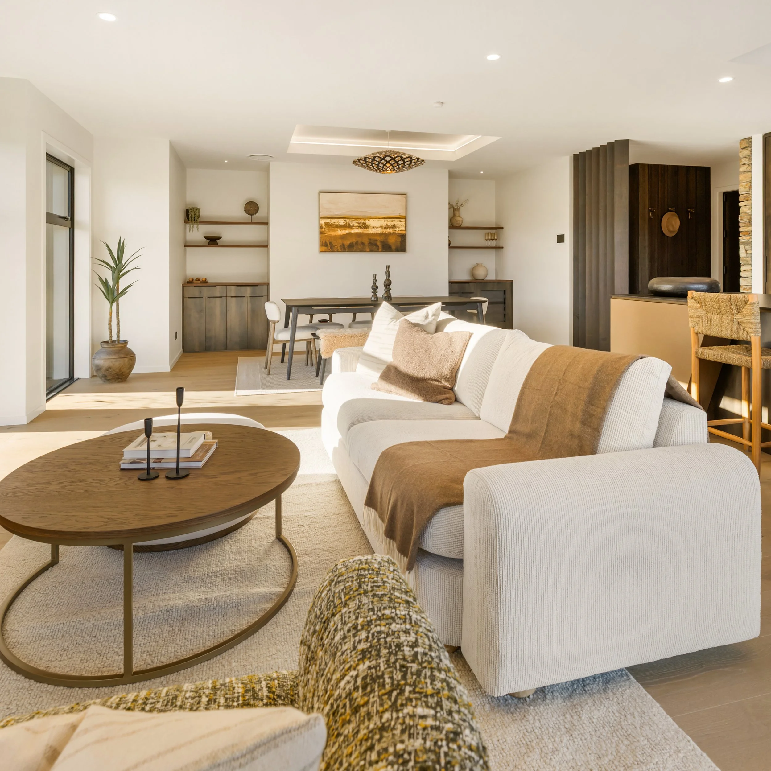 Some homes tell you exactly how they want to feel, and this beautiful Wanaka home was one of them.

With its richly dark stained timber panelling, warm brown tones, and natural textures, it made sense to build on what was already there. Rather than i